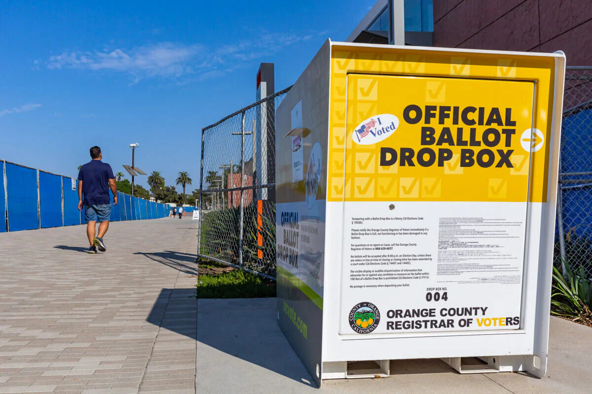 The County of Orange, Calif., has voting ballot boxes available to local citizens as they walk toward government buildings in Santa Ana, Calif., on Sept. 18, 2020. (John Fredricks/The Epoch Times)