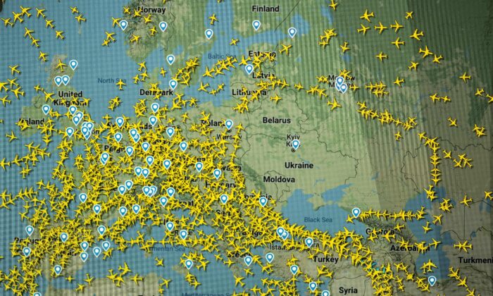 A photo shows a page on the Flightradar24 website that shows flights avoiding Ukraine and nearby countries on Feb. 24, 2022. (Loic Venance/AFP via Getty Images)