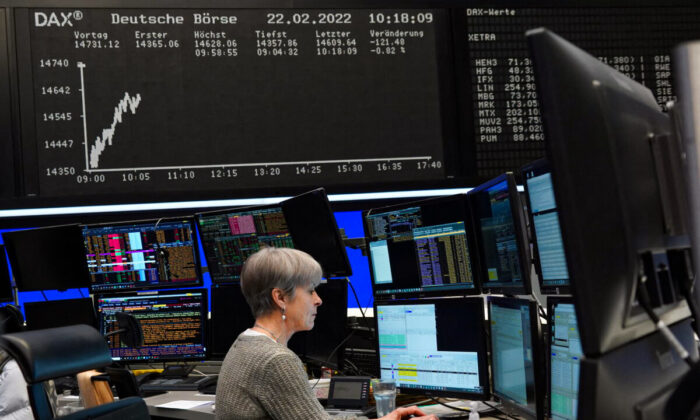 A trader works at the Frankfurt stock exchange in Frankfurt, Germany, on Feb. 22, 2022. (Timm Reichert/Reuters)