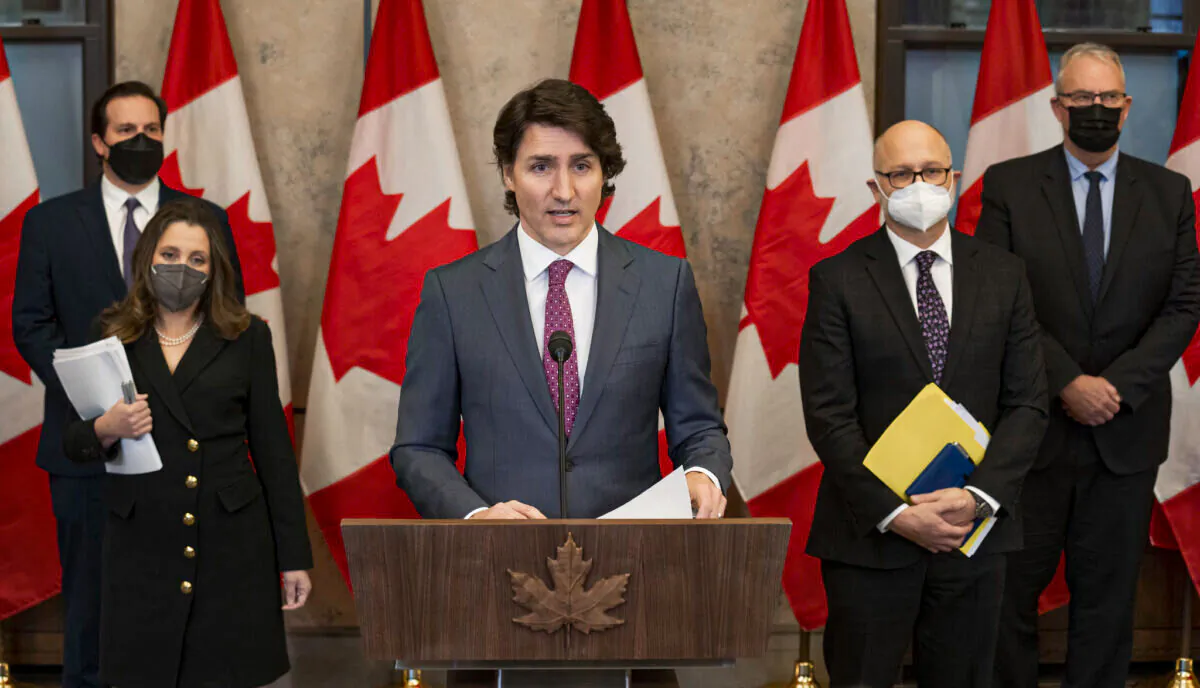 Prime Minister Justin Trudeau and members of his cabinet announce the Emergencies Act will be invoked to deal with convoy protests in Ottawa on Feb. 14, 2022. (Hailey Sani/Public Domain)