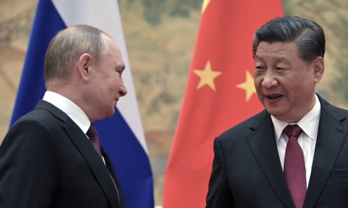 Russian President Vladimir Putin and Chinese leader Xi Jinping during their meeting in Beijing on Feb. 4, 2022. (Alexei Druzhinin/Sputnik/AFP via Getty Images)