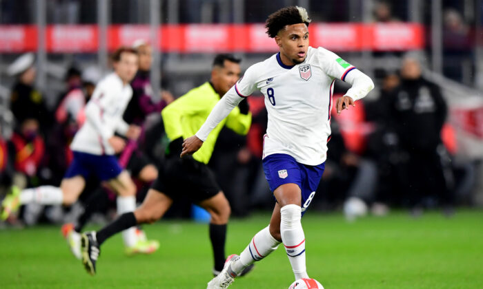 Weston McKennie #8 of the United States controls the ball during the first half of a FIFA World Cup 2022 qualifying match against Mexico at TQL Stadium, in Cincinnati, on Nov. 12, 2021. (Emilee Chinn/Getty Images)