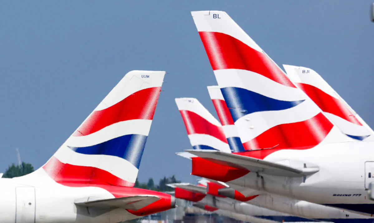 British Airways tail fins are pictured at Heathrow Airport in London, on May 17, 2021. (John Sibley/Reuters)
