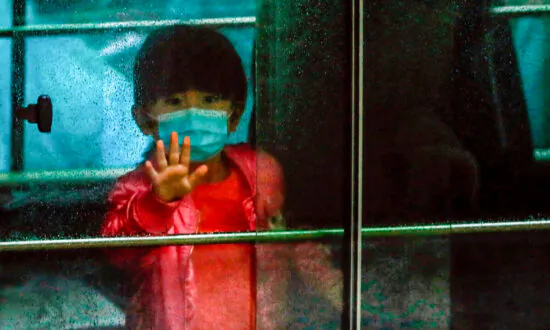Hong Kong Families Despair as COVID-19 Rules May Separate Them From Children
