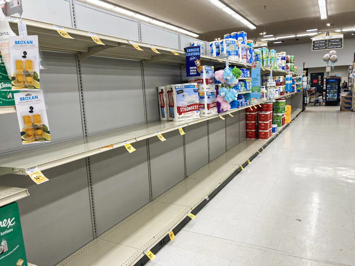Empty shelves greet a customer at a Safeway grocery store in Williams, Ariz., on Sept. 26, 2021. (Allan Stein/The Epoch Times)