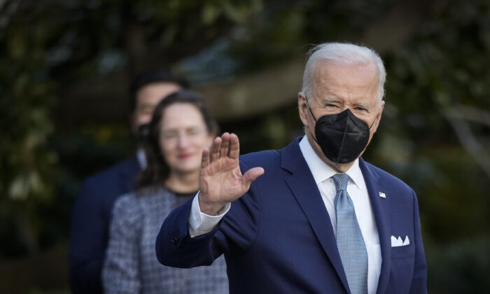 President Joe Biden waves as he prepares to leave Washington for Wilmington, Del., on Feb. 25, 2022. (Drew Angerer/Getty Images)
