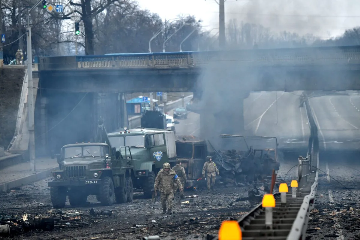 Ukrainian service members in Kyiv, Ukraine, on Feb. 26, 2022. (Sergei Supinsky/AFP via Getty Images)