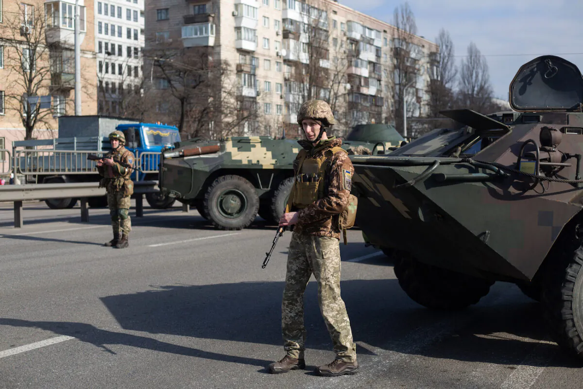 Ukrainian servicemen protect the checkpoint in Kyiv, Ukraine, on Feb. 25, 2022. (Anastasia Vlasova/Getty Images)