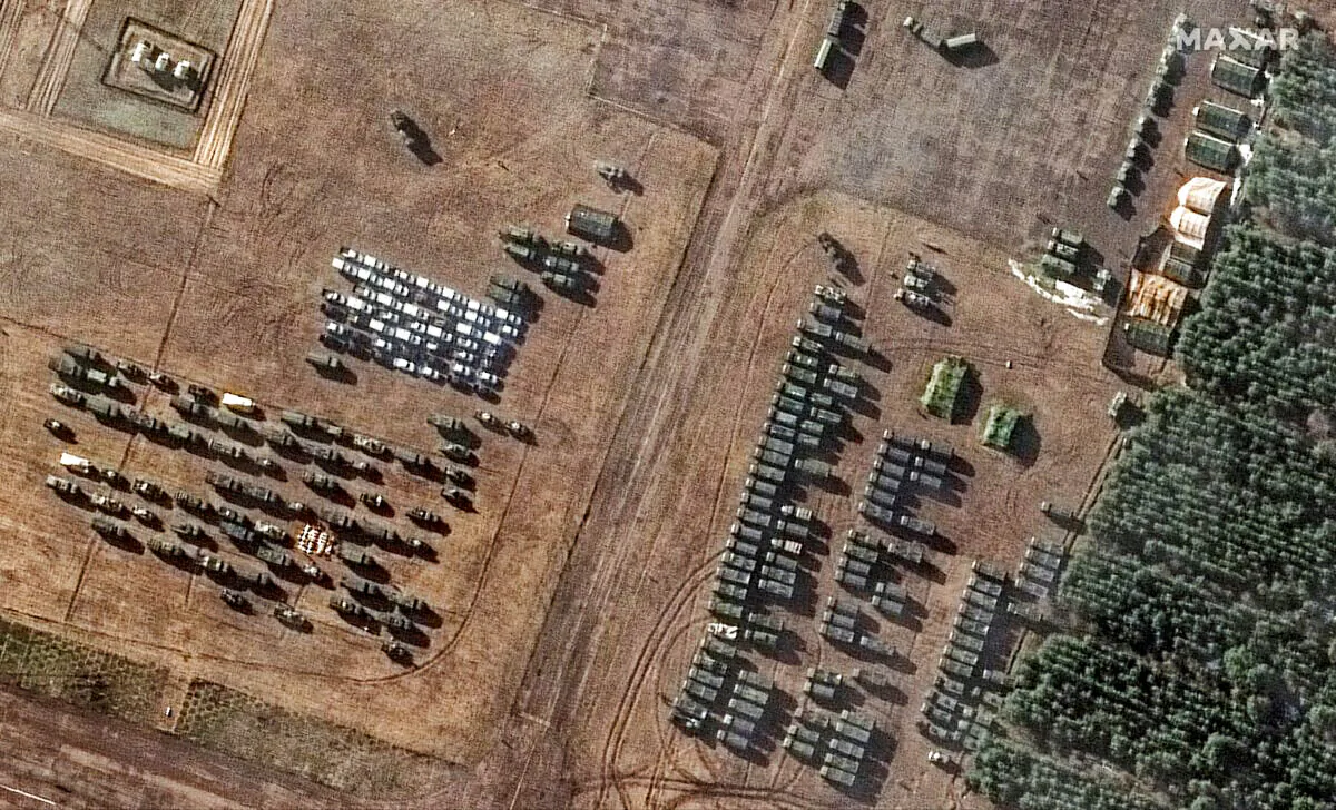 A satellite image shows assembled vehicles at V D Bolshoy Bokov airfield, near Mazyr, Belarus, on Feb. 22, 2022. (Courtesy of Satellite image ©2022 Maxar Technologies/Handout via Reuters) 