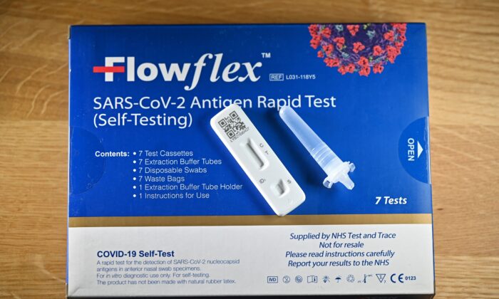 A Flowflex COVID-19 Lateral Flow (LFT) self-test kit, containing a SARS-CoV-2 Antigen Rapid Test, arranged for a photograph, in London on Feb. 20, 2022. (Justin Tallis/AFP via Getty Images)