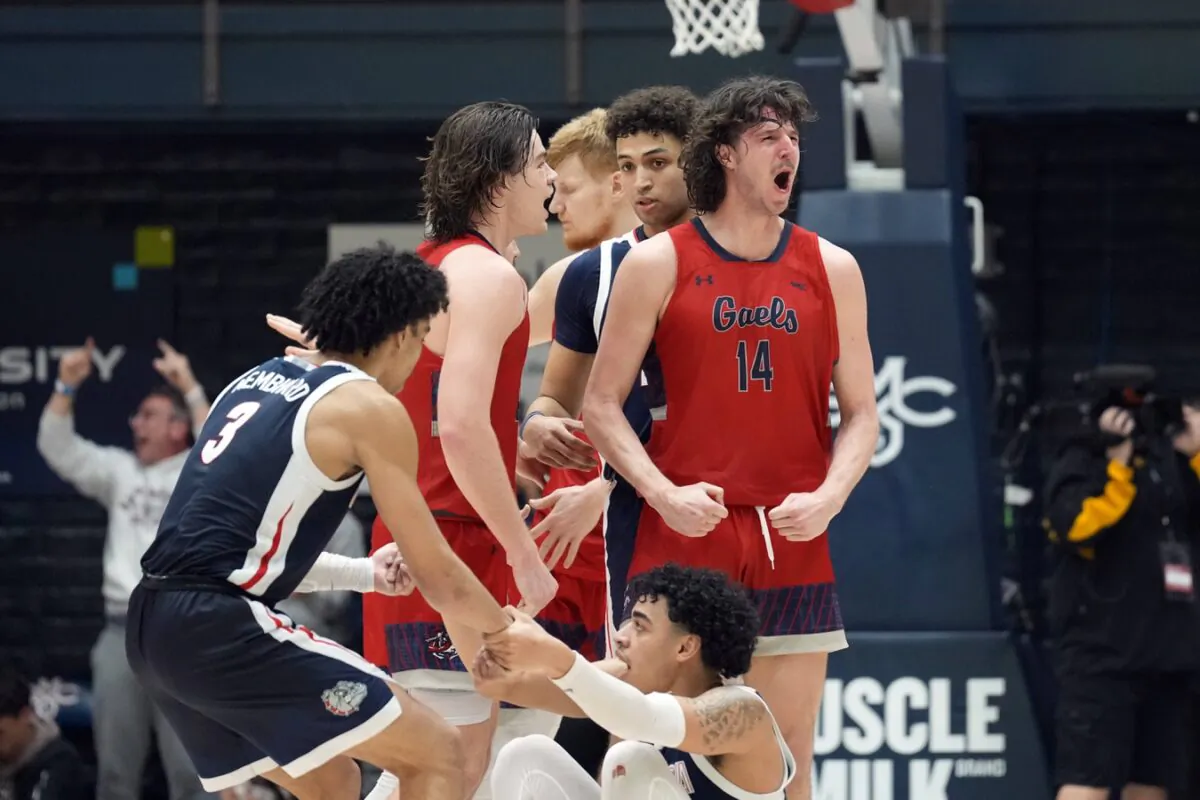 Saint Mary's Gaels forward Kyle Bowen (14) reacts after drawing a charging foul from Gonzaga Bulldogs guard Julian Strawther (0) during the second half at University Credit Union Pavilion in Moraga, Calif., on Feb. 26, 2022. (Darren Yamashita/USA TODAY Sports via Field Level Media)