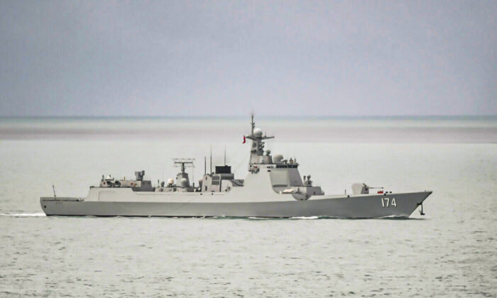 A People's Liberation Army -Navy (PLA-N) Luyang-class guided missile destroyer leaves the Torres Strait and enters the Coral Sea on 18 Feb. 2022 (Supplied/Australian Defence Department). 