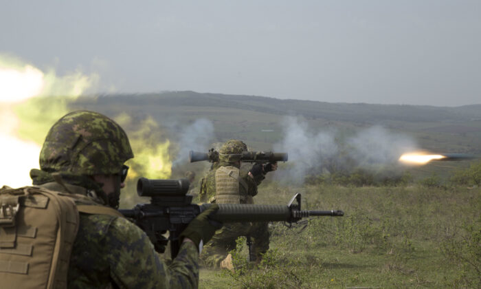 Canadian soldiers fire the Carl Gustav short-range anti-armoured weapon during a live-fire frontal assault exercise on a firing range during Operation REASSURANCE, in Cincu, Romania, on April 9, 2016.
(Corporal Guillaume Gagnon/CAF Combat Camera via Flickr)