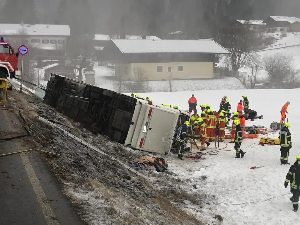 A tourist bus headed for the Austrian Alps crashed on a local highway in Upper Bavaria Saturday morning, injuring 43 of the 61 people on board, Inzell, Germany on Feb. 26, 2022. (Hubert Hobmaier/ Fire Department Traunstein via AP)