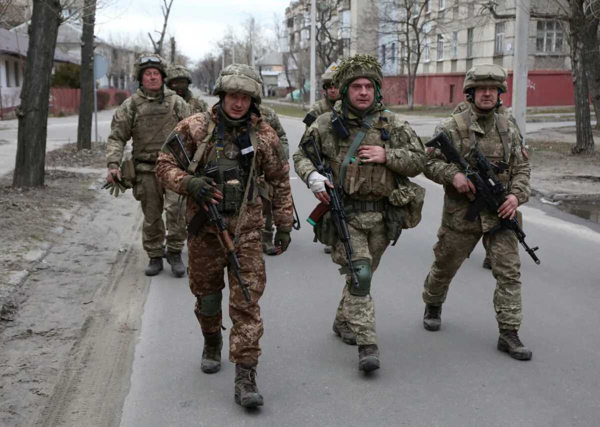 Members of the Ukrainian Military Forces patrol in the small town of Sievierodonetsk, Lugansk Oblast, on Feb. 27, 2022. (Anatolii Stepanov/AFP via Getty Images)