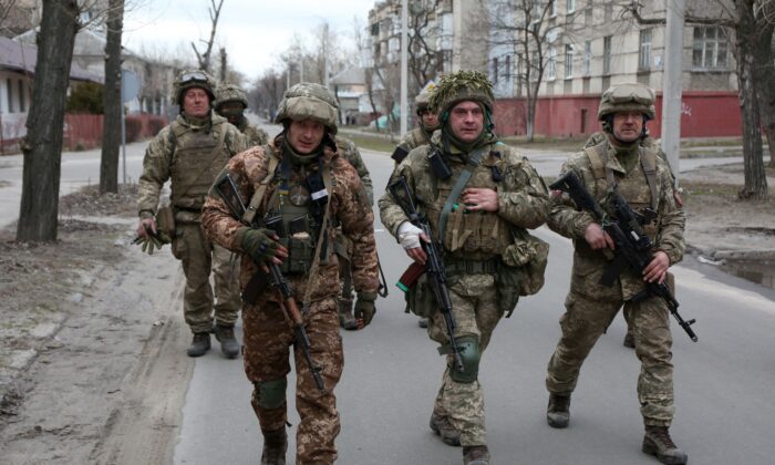 Members of the Ukrainian Military Forces patrol in the small town of Sievierodonetsk, Lugansk Oblast, on Feb. 27, 2022. (Anatolii Stepanov/AFP via Getty Images)