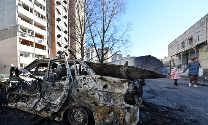 A view of the car which was destroyed by recent shelling in the outskirts of Kyiv, Ukraine, on Feb. 28, 2022. (Genya Savilov//AFP via Getty Images)