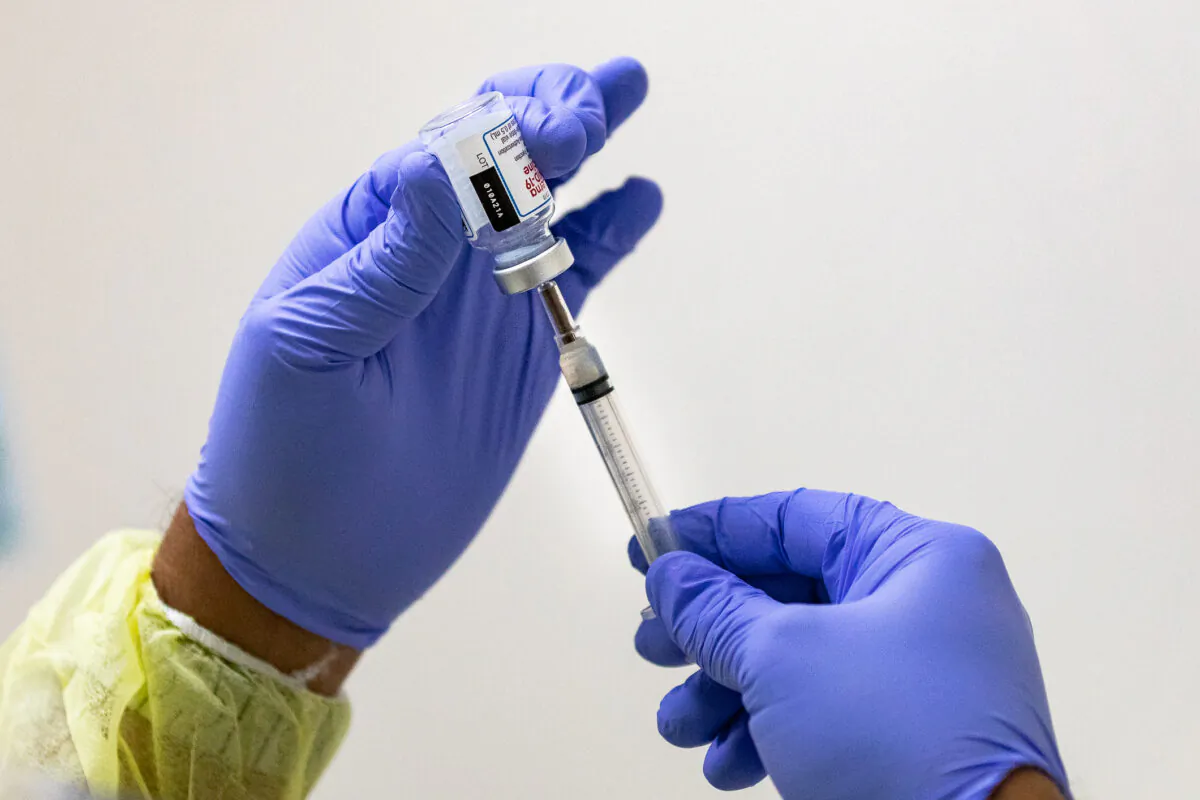 A shot of COVID-19 Moderna Vaccine being prepared at Lestonnac Free Clinic in Orange, Calif., on March 9, 2021. (John Fredricks/The Epoch Times)