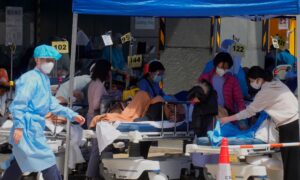 Hong Kong Considers Lockdown as Daily Infections Top 34,000