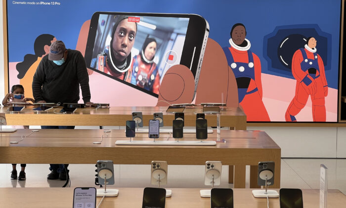 iPhone 13s are displayed at an Apple store in Corte Madera, Calif. on Jan. 27, 2022. (Justin Sullivan/Getty Images)