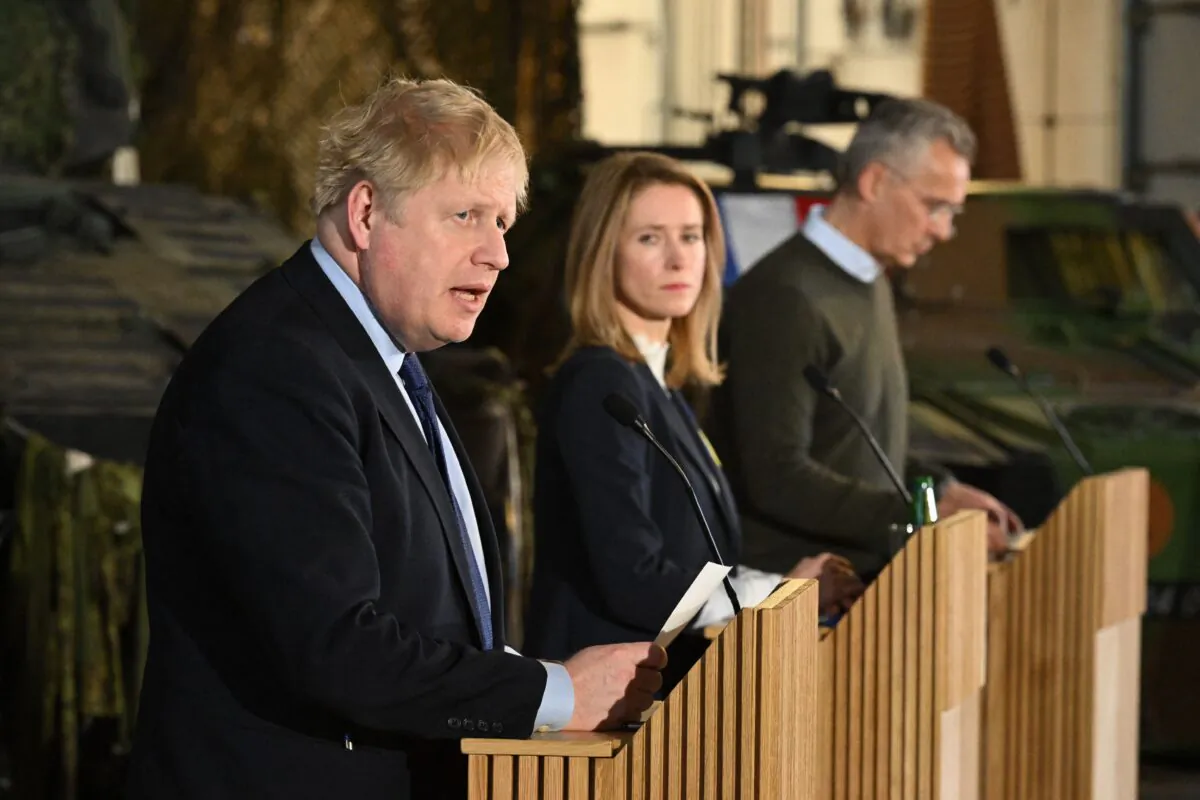 (L-R) British Prime Minister Boris Johnson speaks during a joint press conference with Prime Minister of Estonia Kaja Kallas and Secretary-General of NATO Jens Stoltenberg at the Tapa army base in Tallinn, Estonia, on March 1, 2022. (Leon Neal /Pool/AFP via Getty Images)
