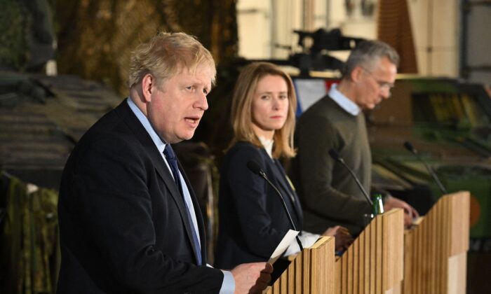 (L-R) British Prime Minister Boris Johnson speaks during a joint press conference with Prime Minister of Estonia Kaja Kallas and Secretary-General of NATO Jens Stoltenberg at the Tapa army base in Tallinn, Estonia, on March 1, 2022. (Leon Neal /Pool/AFP via Getty Images)