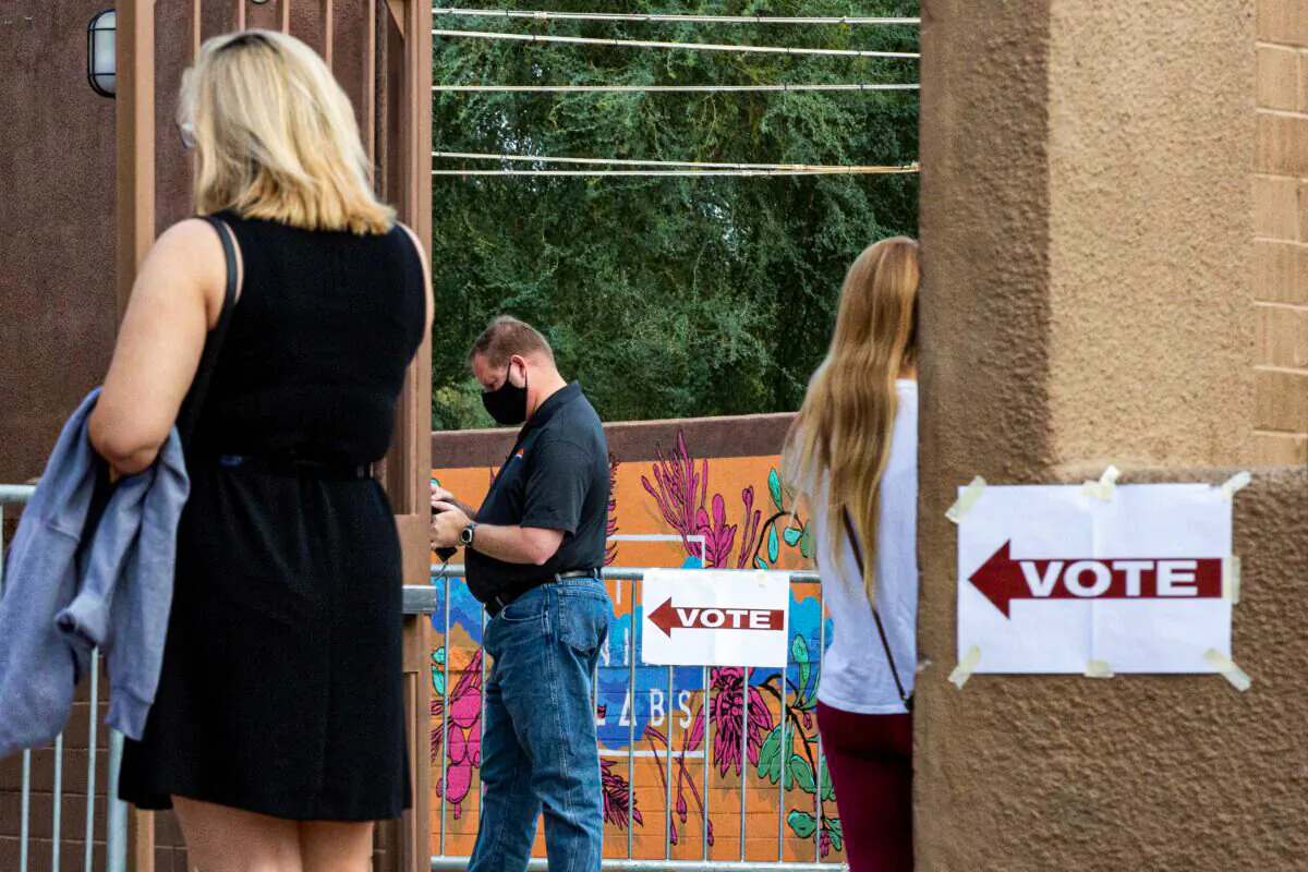 Voters wait to cast their ballots at Marquee Theatre in Tempe, Ariz., on Nov. 3, 2020. (Courtney Pedroza/Getty Images)