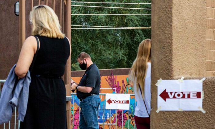 Voters wait to cast their ballots at Marquee Theatre in Tempe, Ariz., on Nov. 3, 2020. (Courtney Pedroza/Getty Images)
