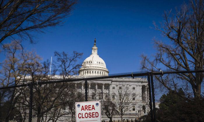 Fences and barriers surround the U.S. Capitol after being re-installed ahead of President Joe Biden's State of the Union Address before a Joint Session of Congress on Feb. 27, 2022, in Washington, D.C. The State of the Union is scheduled for March 1. (Pete Marovich/Getty Images)