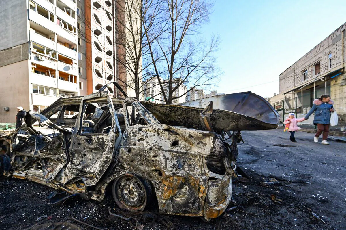 A view of the car which was destroyed by recent shelling in Kyiv outskirts on Feb. 28, 2022. (Genya Savilov//AFP via Getty Images)