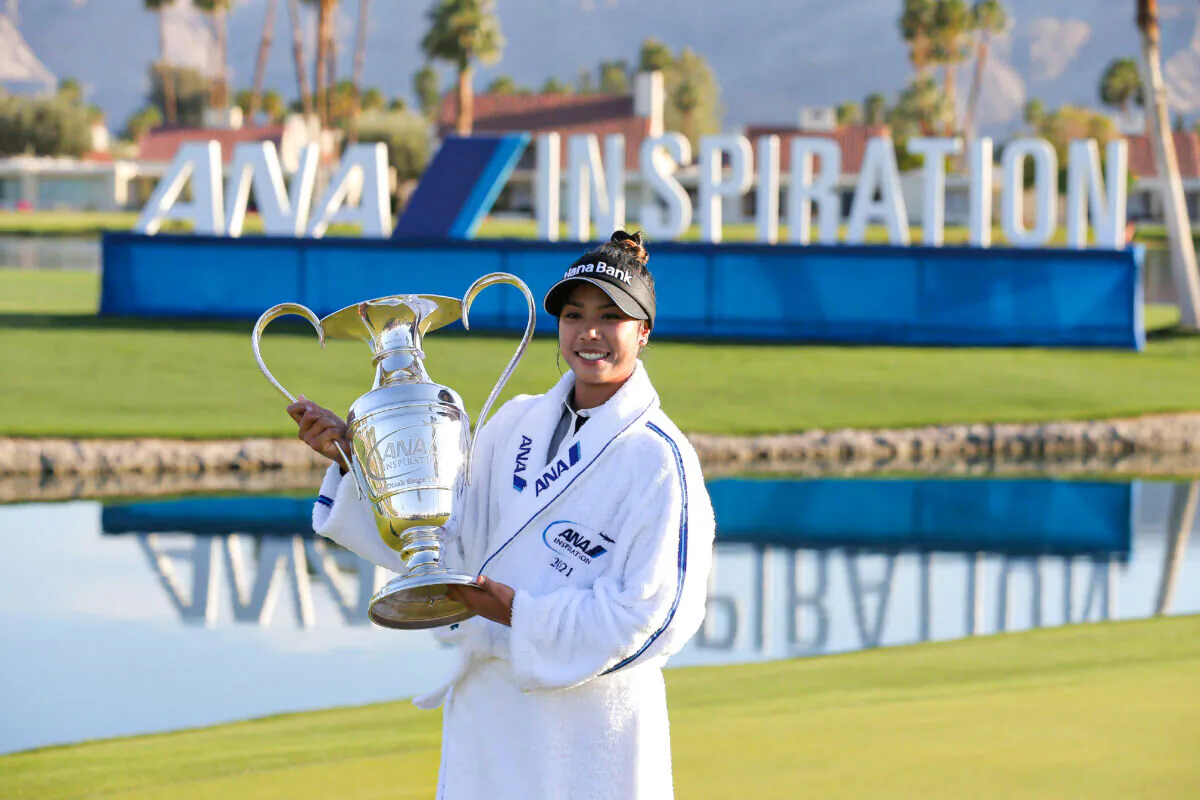 Patty Tavatanakit of Thailand poses with the trophy after winning the ANA Inspiration at the Dinah Shore course at Mission Hills Country Club in Rancho Mirage, California, on April 4, 2021. (Michael Owens/Getty Images)