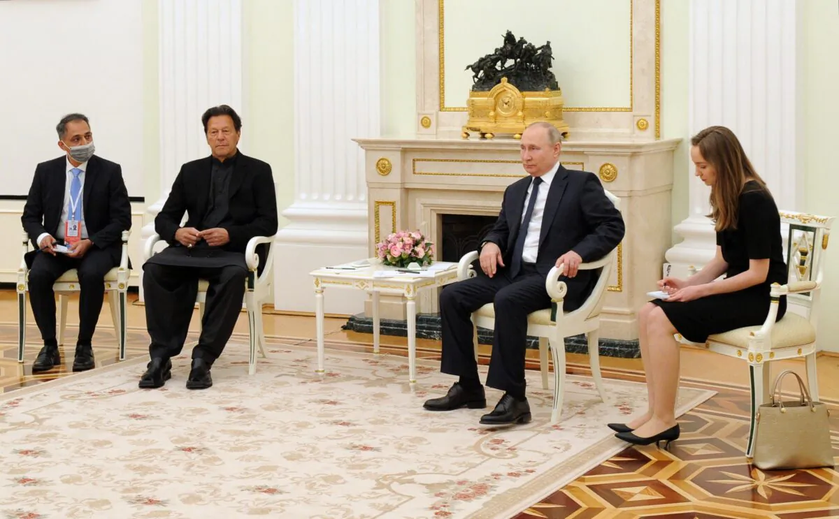 Russian President Vladimir Putin meets with Pakistan's Prime Minister Imran Khan at the Kremlin in Moscow on Feb. 24, 2022. (MIKHAIL KLIMENTYEV/SPUTNIK/AFP via Getty Images)