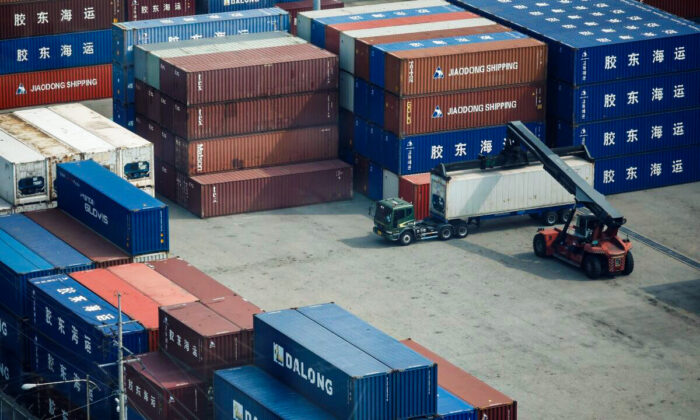 A truck moves a shipping container at Pyeongtaek port in Pyeongtaek, South Korea, on July 9, 2020. (Kim Hong-Ji/Reuters)