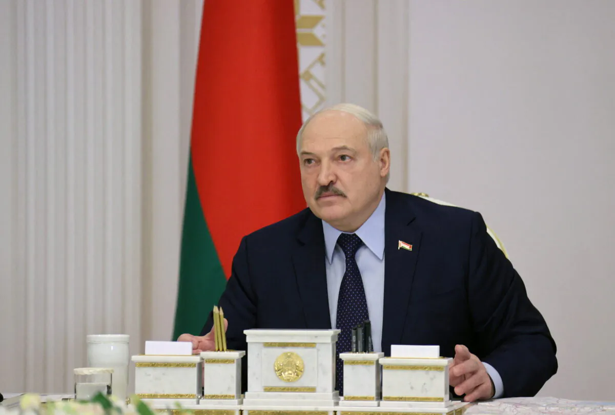 Belarusian President Alexander Lukashenko chairs a meeting with military officials in Minsk, Belarus. (Nikolay Petrov/BelTA via Reuters)