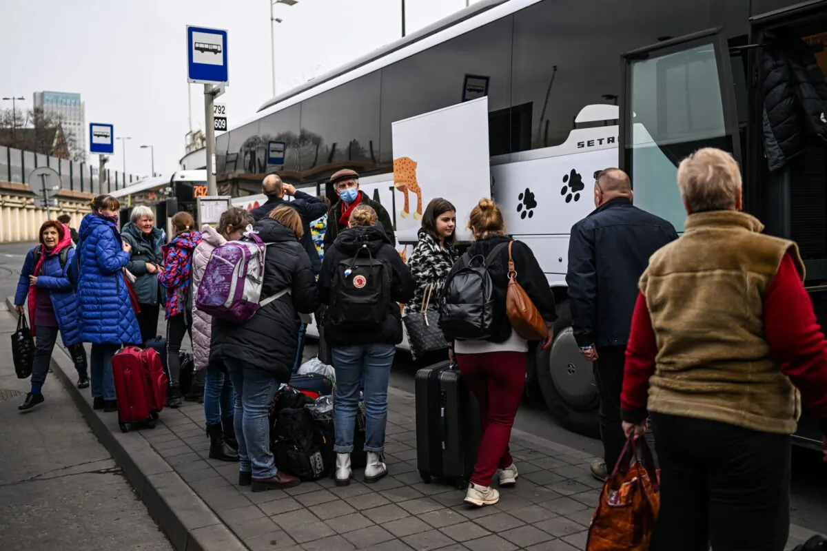 People who fled the war in Ukraine arrive by bus in Krakow, Poland on March 29, 2022. (Omar Marques/Getty Images)