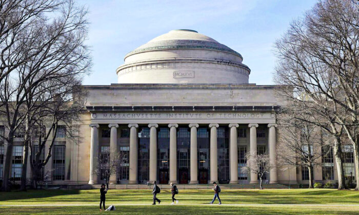In this April 3, 2017 file photo, students walk past the "Great Dome" atop Building 10 on the Massachusetts Institute of Technology campus in Cambridge, Mass. Two prominent researchers are quitting MIT's Media Lab over revelations that the famed technology research hub and its director took money from Jeffrey Epstein after he'd served time for sex offenses involving girls and young women. Ethan Zuckerman, director of the lab's Center for Civic Media, said director Joi Ito had failed to disclose the deceased financier's funding of the Massachusetts Institute of Technology incubator as well as investments Epstein made in Ito's personal venture capital fund, Wednesday, Aug. 21, 2019. (AP Photo/Charles Krupa, File)