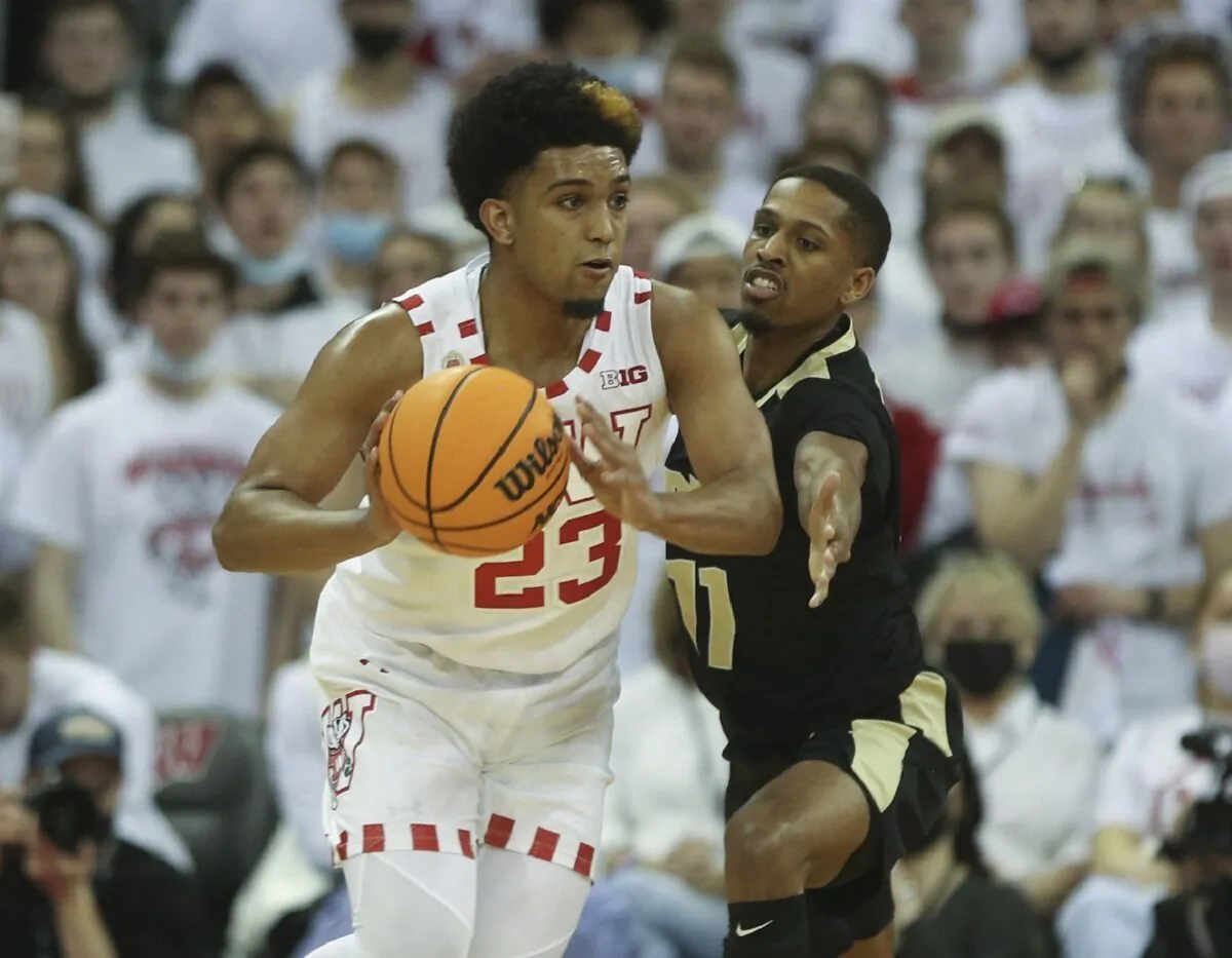 Wisconsin Badgers guard Chucky Hepburn (23) looks to pass as Purdue Boilermakers guard Isaiah Thompson (11) defends at the Kohl Center in Madison, Wis., on Mar 1, 2022. (Mary Langenfeld/USA TODAY Sports via Field Level Media)