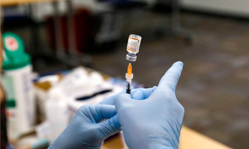 A nurse prepares the Pfizer COVID-19 vaccine in a file image. (Jeff Kowalsky/AFP via Getty Images)
