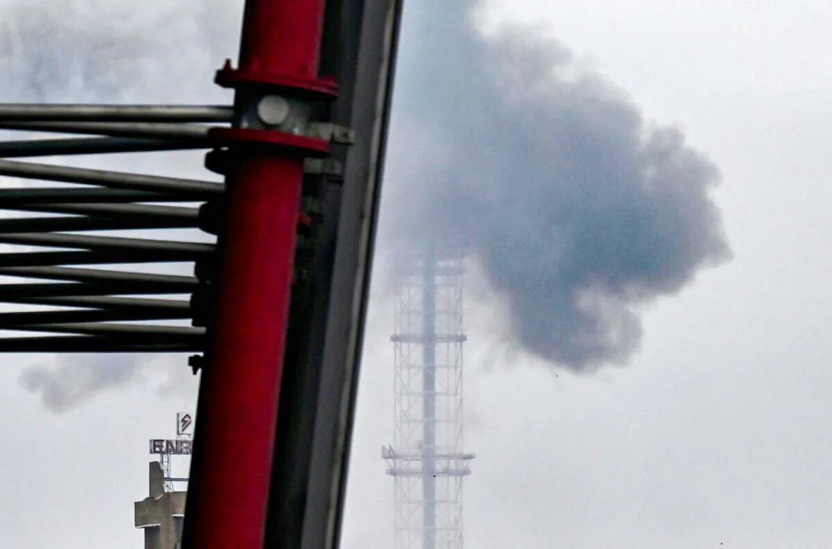 Smoke billows over Kyiv after a missile attack targeting the Ukrainian capital's television tower in Kyiv, Ukraine on March 1, 2022. (Aris Messinis/AFP via Getty Images)