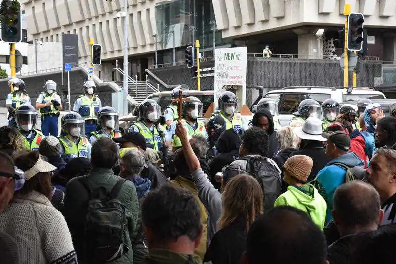 Anti-vaccine mandate protesters are seen outside Parliament House in Wellington, New Zealand, Wednesday, March 2, 2022. (AAP Image/Ben McKay) 