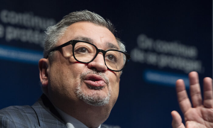 Quebec Public Health Director Horacio Arruda speaks during a news conference in Montreal on Dec. 22, 2021. (Graham Hughes/The Canadian Press)