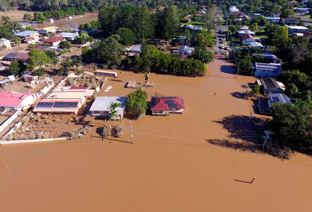Properties in the suburb of Goodna in the far south-western outskirts of Brisbane are seen inundated by flood waters in Brisbane, Australiaon March 01, 2022 . (Photo by Bradley Kanaris/Getty Images)