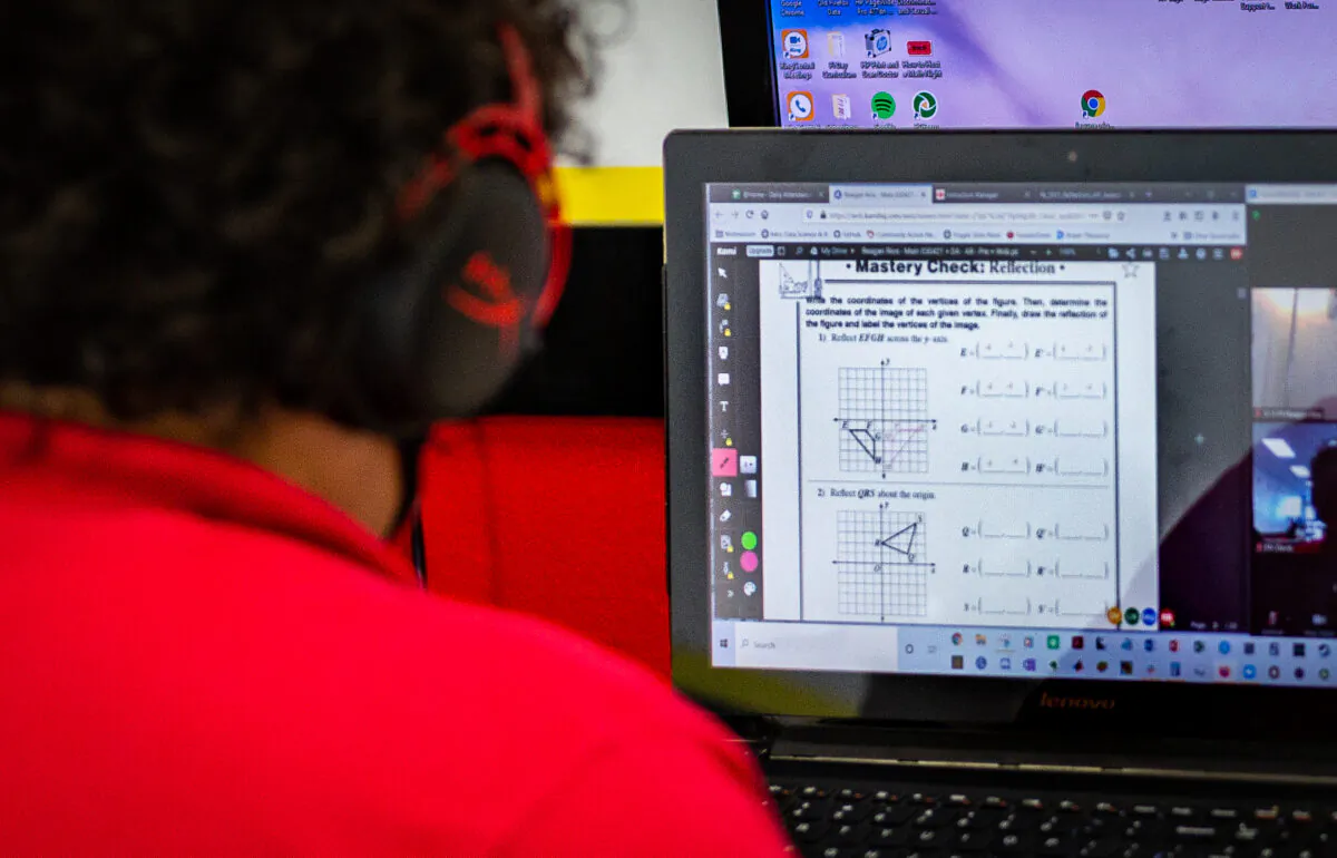 A student works with a math tutor in Laguna Niguel, Calif., on May 12, 2021. (John Fredricks/The Epoch Times)
