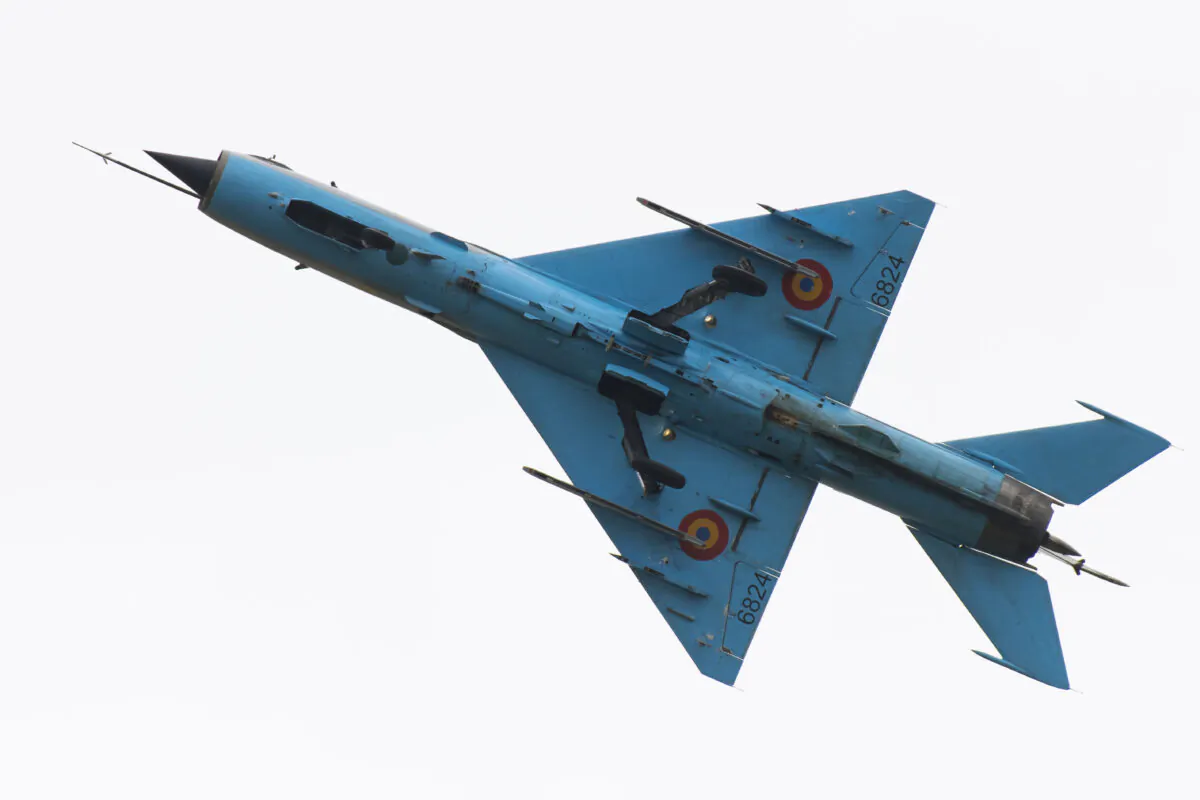 A Romanian Air Force MiG-21 LanceR performs during the International Air Tattoo at RAF Fairford in Fairford, England, on July 21, 2019. (Matthew Horwood/Getty Images)