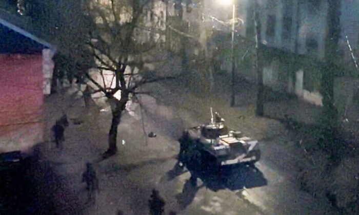 A military tank is seen on a street of Kherson, Ukraine, on March 1, 2022. (Screenshot via Reuters)