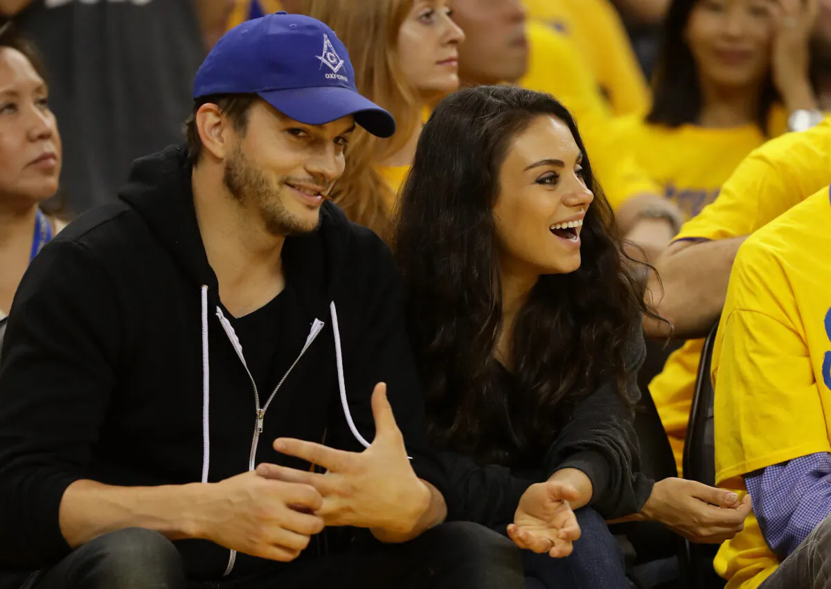 Actors Ashton (L) Kutcher and Mila Kunis attend Game 2 of the 2016 NBA Finals between the Golden State Warriors and the Cleveland Cavaliers at ORACLE Arena, in Oakland, Calif., on June 5, 2016. (Ezra Shaw/Getty Images)