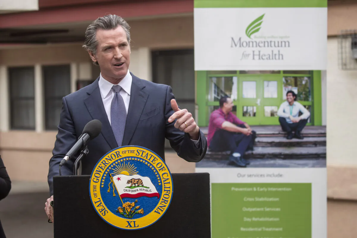 Gov. Gavin Newsom, speaking at a mental health treatment center in San Jose, Calif., announces "Care Court," a program that would target people suffering from psychosis who have lost their ability to care for themselves, on March 3, 2022. (Karl Mondon/Bay Area News Group via AP)