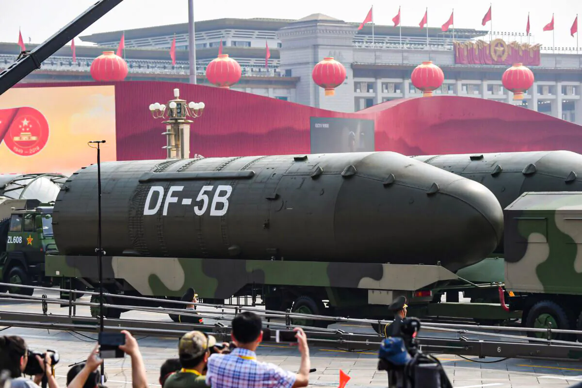 Military vehicles carrying DF-5B intercontinental ballistic missiles participate in a military parade at Tiananmen Square in Beijing on Oct. 1, 2019. (Greg Baker/AFP via Getty Images)
