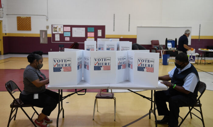 Voters cast their ballots at Keevan Elementary School in North St. Louis, Mo., on Aug. 4, 2020. (Michael B. Thomas/Getty Images)