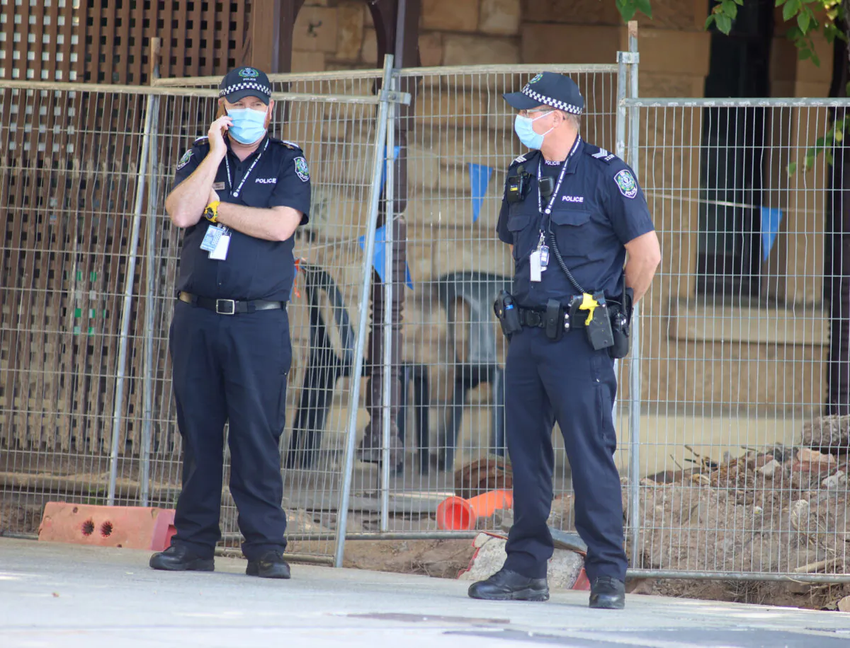 Police officers at M Suites in North Adelaide, Australia, on Jan. 28, 2021. (Kelly Barnes/Getty Images)